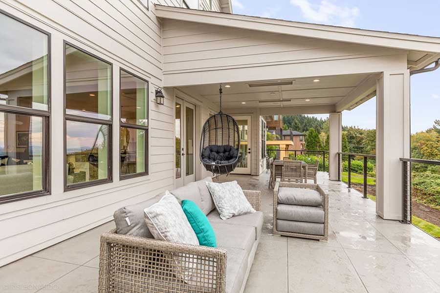 The Lily Custom Home Back Exterior Lower Deck